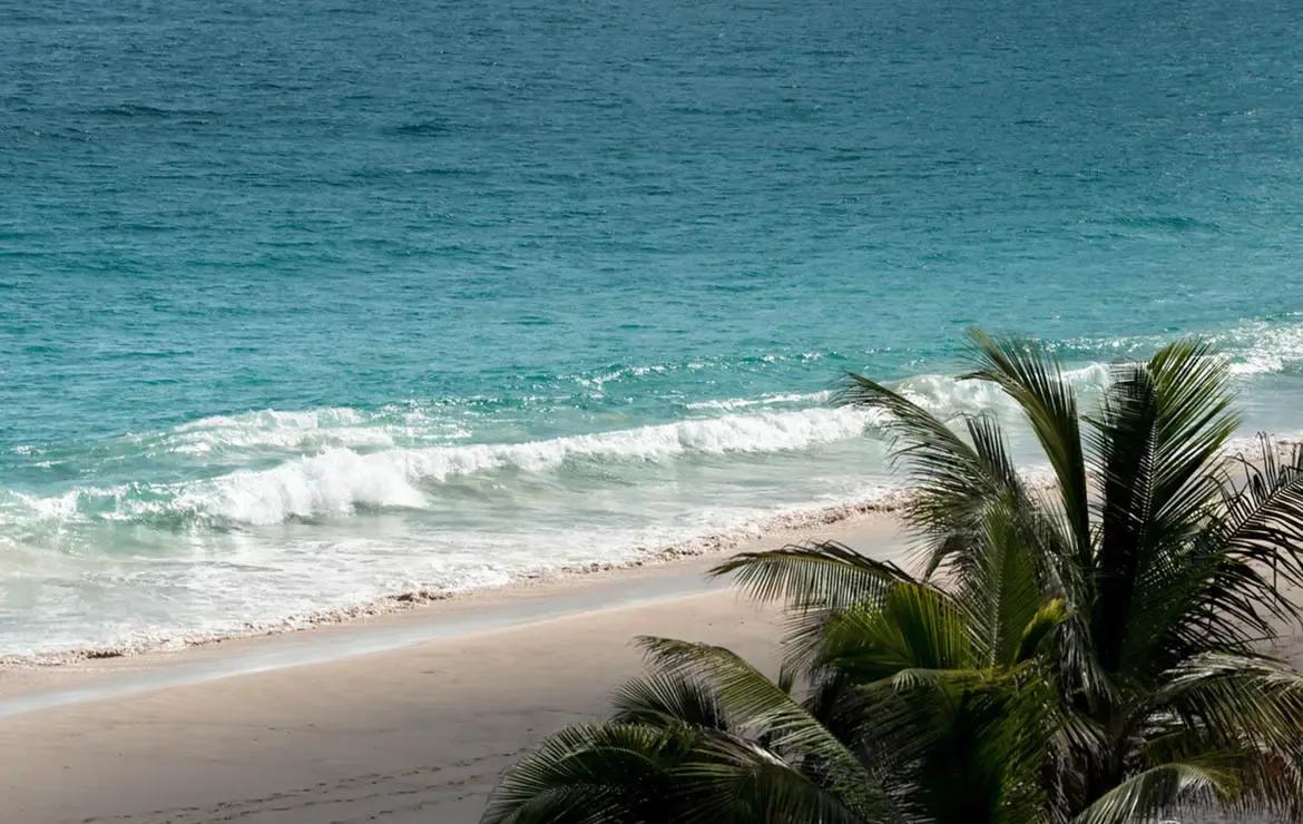Just steps away, the turquoise waters and soft sands of Gouverneur Beach invite you to a world of coastal tranquility and natural beauty.