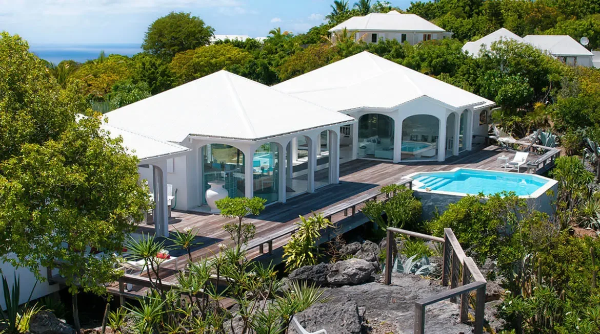 Indulge in the serene luxury of Villa Byzance, where a shimmering pool blends with lush tropical gardens and sweeping ocean vistas. This exclusive St. Barths retreat offers effortless elegance and privacy amid Caribbean beauty.                                                                                                                                                                                                                                                                                         +
 